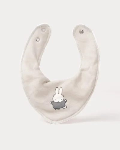 Miffy bib in soft, double-layered cotton. Absorbent, comfortable and adjustable. Ideal for meals, playtime and teething.